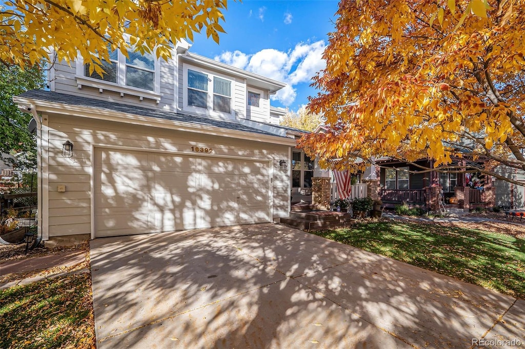 view of front of property with a garage