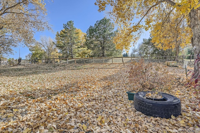 view of yard featuring a fire pit