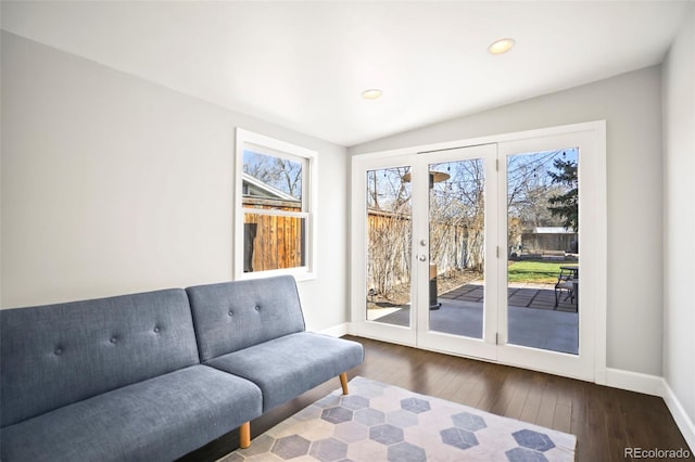 sitting room with french doors, recessed lighting, baseboards, and wood-type flooring