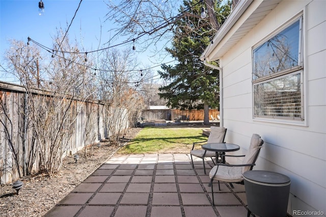 view of patio with a fenced backyard