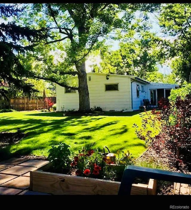 view of yard featuring fence