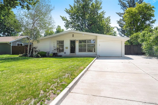 1360 S Hudson St, Denver, CO 80222 - view of front of home with concrete driveway and an attached garage