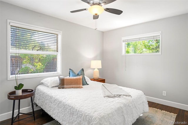 1360 S Hudson St, Denver, CO 80222 - bedroom featuring dark wood-style floors and ceiling fan