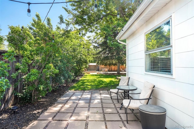 1360 S Hudson St, Denver, CO 80222 - fenced backyard with a patio