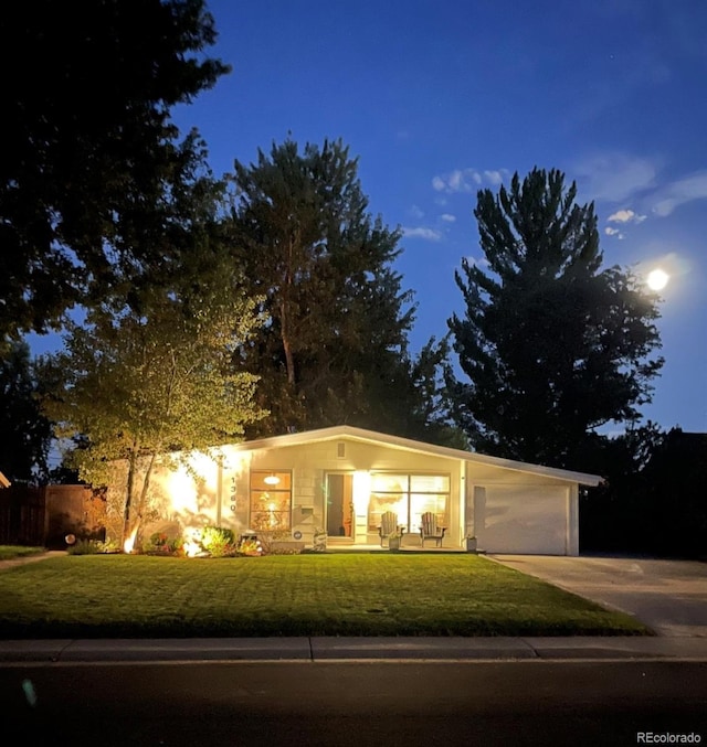 1360 S Hudson St, Denver, CO 80222 - view of front of property featuring concrete driveway and an attached garage