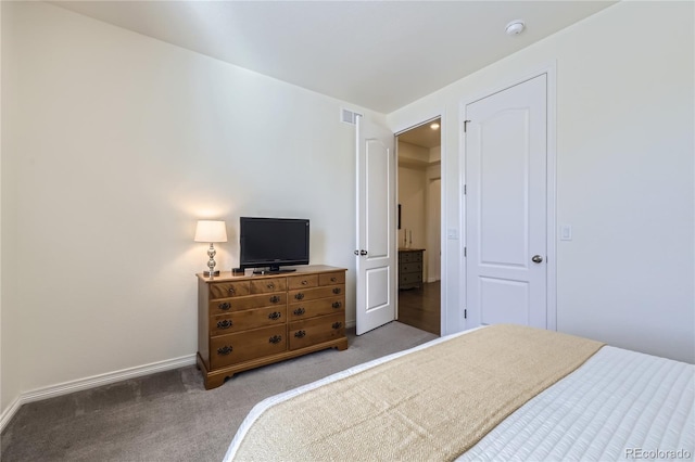 bedroom featuring baseboards, visible vents, and carpet floors
