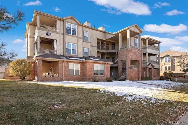 view of snow covered property