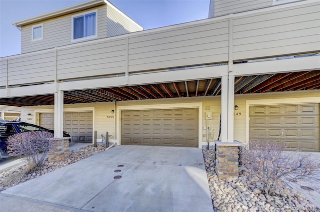 view of side of property featuring a garage