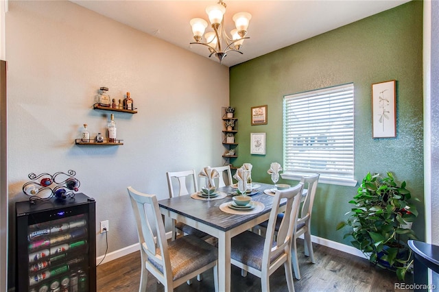 dining space with wine cooler, dark hardwood / wood-style floors, and a notable chandelier