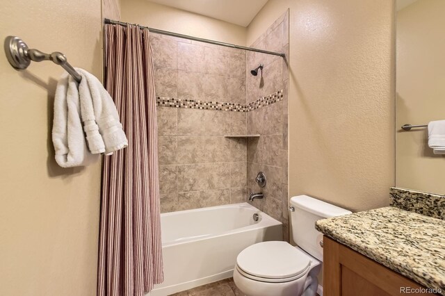 bathroom with toilet, shower / tub combo, and vanity