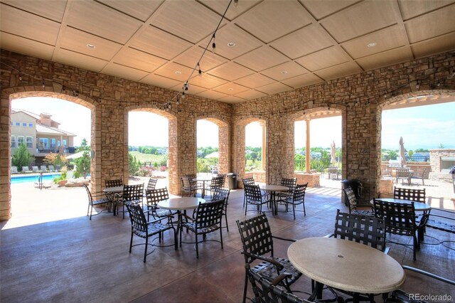view of patio featuring outdoor dining area