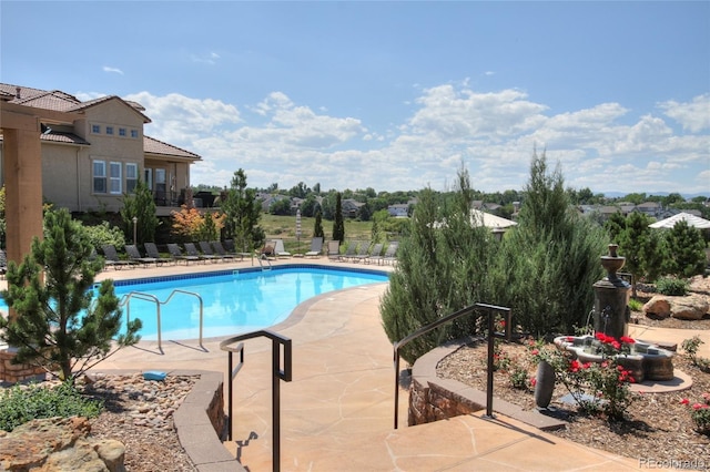 community pool featuring a patio