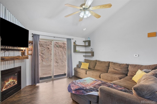 living room with vaulted ceiling, light wood-type flooring, and ceiling fan