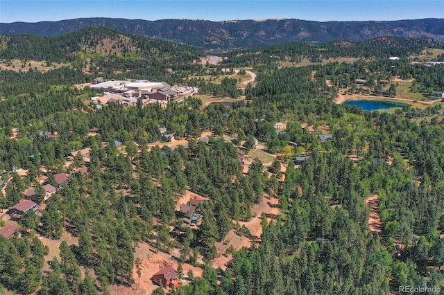 bird's eye view featuring a water and mountain view