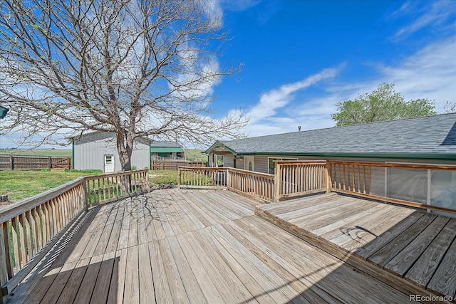 deck featuring an outdoor structure