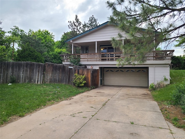 5274 W Rowland Pl, Littleton, CO 80128 - view of front of home featuring concrete driveway and an attached garage