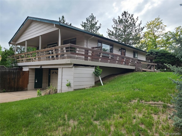 5274 W Rowland Pl, Littleton, CO 80128 - rear view of house featuring a deck