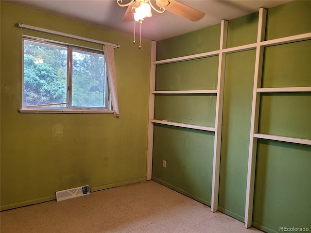 5274 W Rowland Pl, Littleton, CO 80128 - unfurnished bedroom featuring tile patterned floors and baseboards