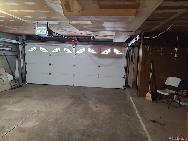 5274 W Rowland Pl, Littleton, CO 80128 - garage featuring a garage door opener