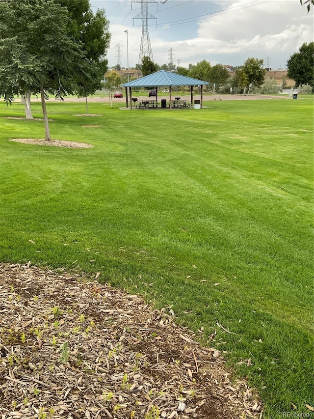 surrounding community featuring a lawn and a gazebo