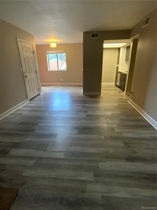 empty room with wood-type flooring