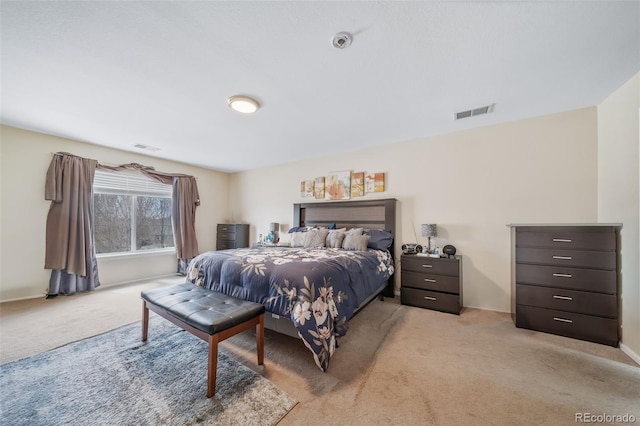 carpeted bedroom with baseboards