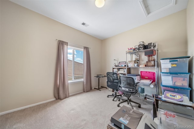 office with carpet floors and baseboards