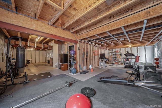 workout room featuring water heater