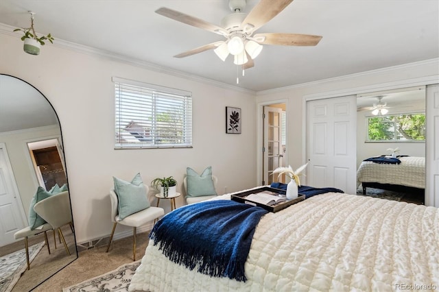 bedroom featuring crown molding, multiple windows, a closet, carpet, and ceiling fan