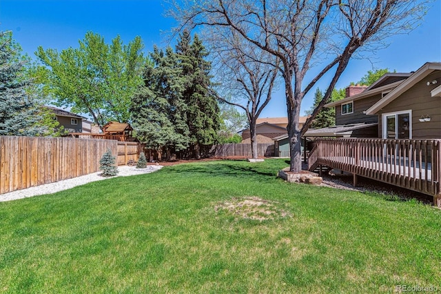 view of yard with a deck