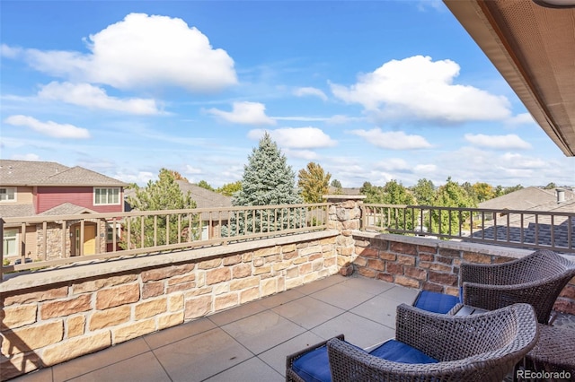 view of patio / terrace featuring a balcony