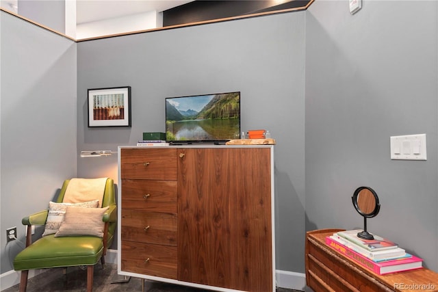 sitting room featuring baseboards