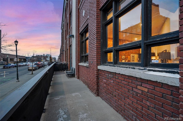 2500 Walnut St Unit 106, Denver, CO 80205 - view of property exterior featuring brick siding