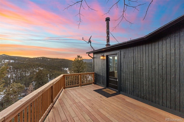 deck at dusk with a mountain view