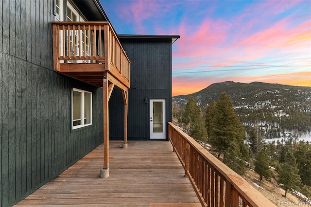 11725 Tomahawk Trl, Conifer, CO 80433 - deck at dusk with a mountain view