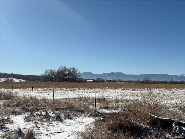 property view of mountains featuring a rural view