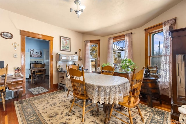 dining area featuring dark hardwood / wood-style floors