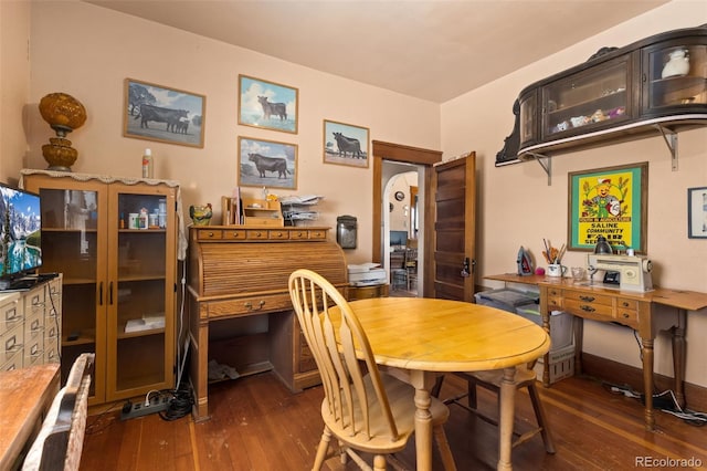 dining room featuring dark hardwood / wood-style flooring