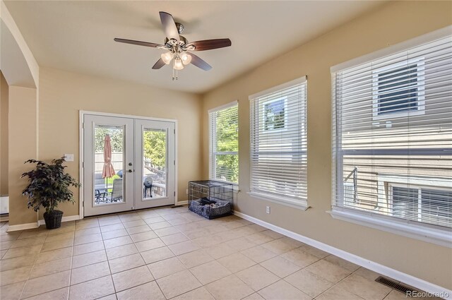 23029 Cleveland Dr, Parker, CO 80138 - unfurnished room with french doors, a ceiling fan, and light tile patterned floors