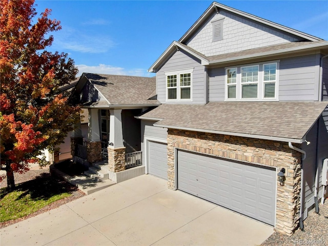 23029 Cleveland Dr, Parker, CO 80138 - craftsman house with stone siding, a shingled roof, a garage, and concrete driveway