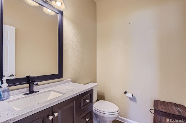 23029 Cleveland Dr, Parker, CO 80138 - bathroom featuring toilet and vanity
