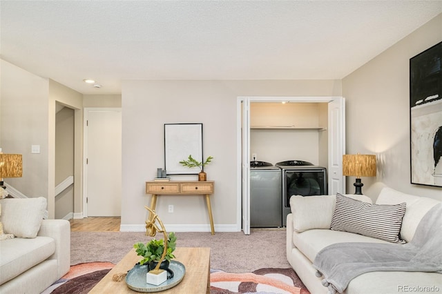 19595 N Mitchell Dr, Denver, CO 80249 - living area with washing machine and clothes dryer and carpet