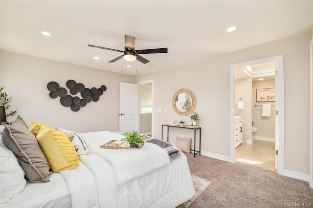 19595 N Mitchell Dr, Denver, CO 80249 - bedroom with light carpet, recessed lighting, ensuite bath, and ceiling fan