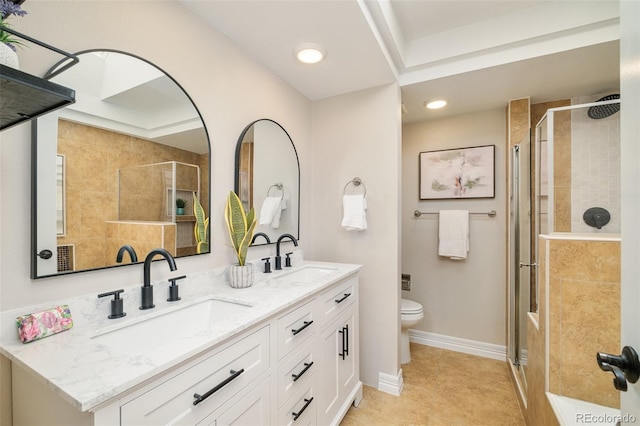 19595 N Mitchell Dr, Denver, CO 80249 - full bath featuring tiled shower, double vanity, and recessed lighting