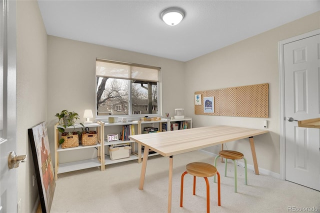 home office with light colored carpet