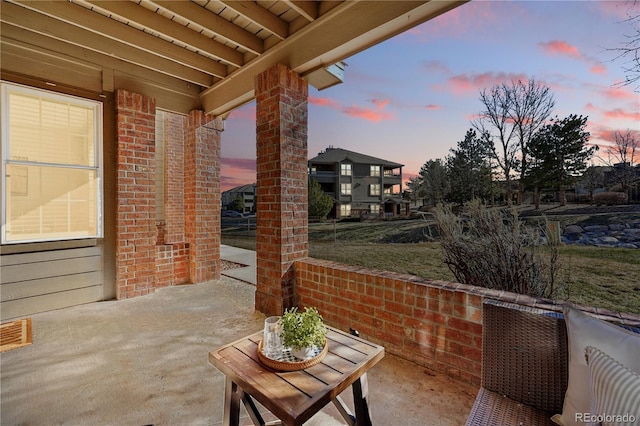 12924 Ironstone Way Unit 103, Parker, CO 80134 - patio terrace at dusk with a patio