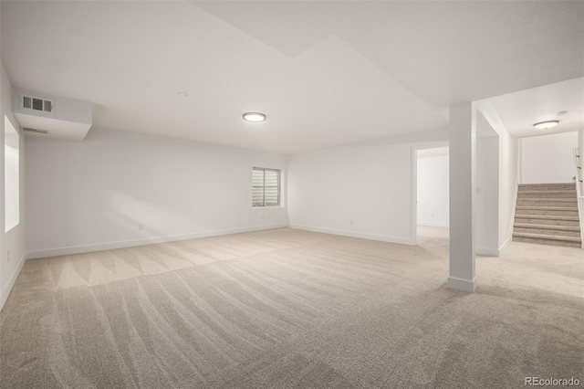 basement with light colored carpet