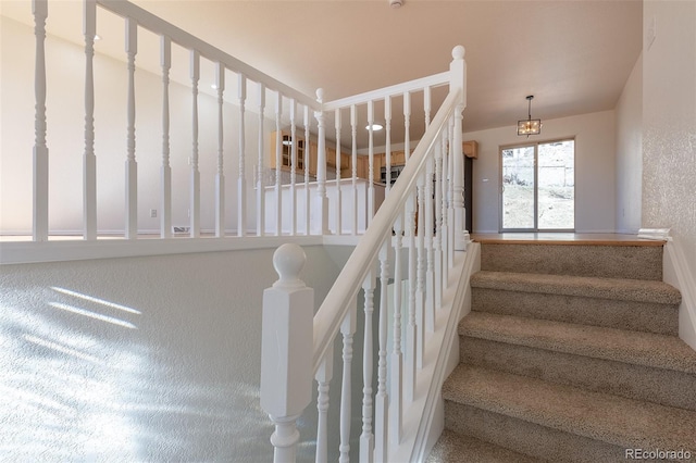 stairs with a textured wall