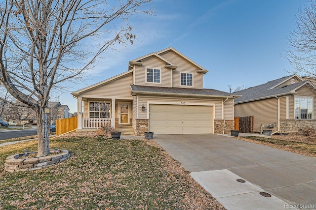 view of front of house with a garage and a front lawn