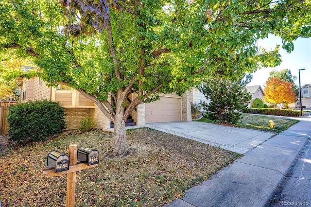 obstructed view of property featuring a garage